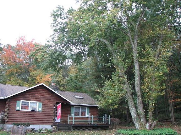 This tree near house has been removed for safety