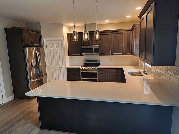 Quality cabinets, quartz countertops and stainless steel appliances.