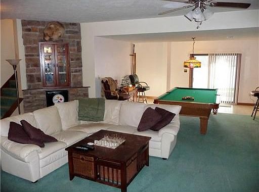 HUGE game room with full bath, fireplace, two extra bedrooms.