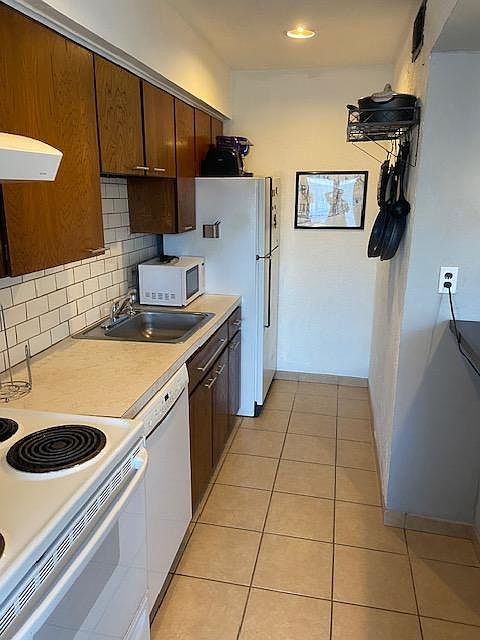Kitchen w/ dishwasher and new faucet