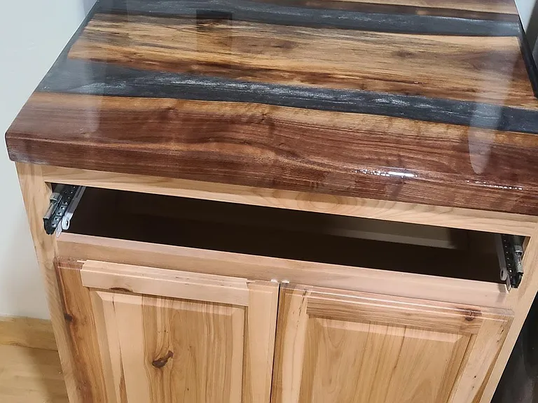 Black Walnut with Expoy River counter tops.