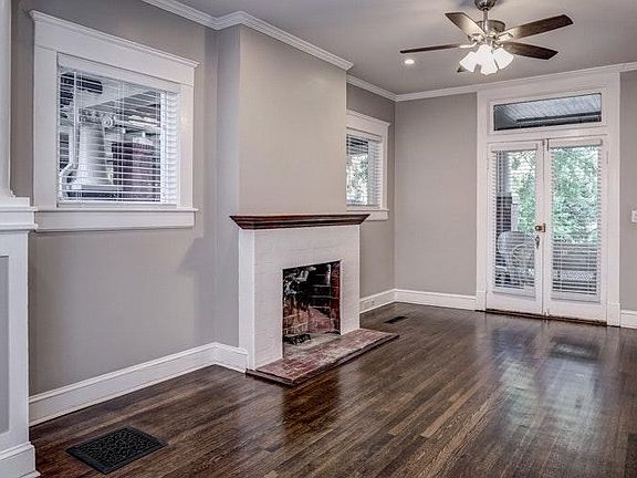Original hardwood floors throughout. 1 of 4 original decora