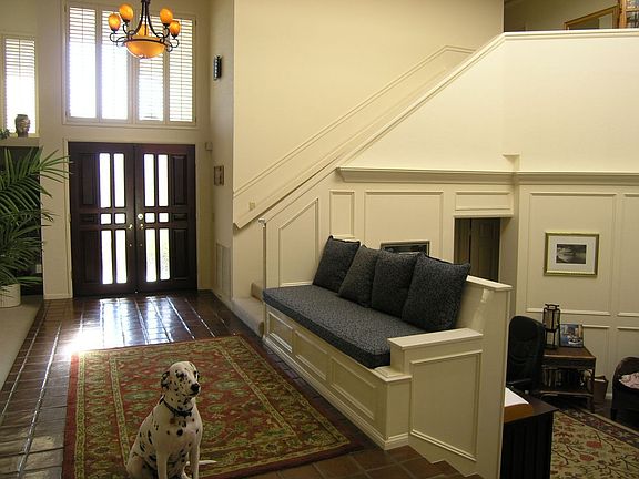 Dramatic entry & step down mezzanine