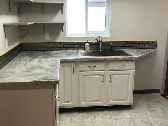 Kitchen with concrete countertops
