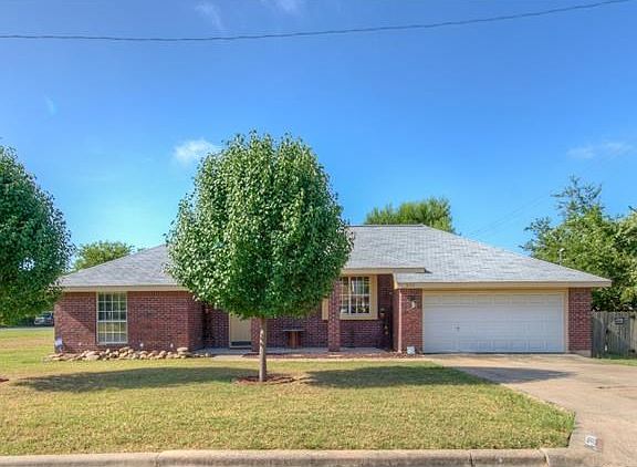 Front elevation, 3 sides brick!
