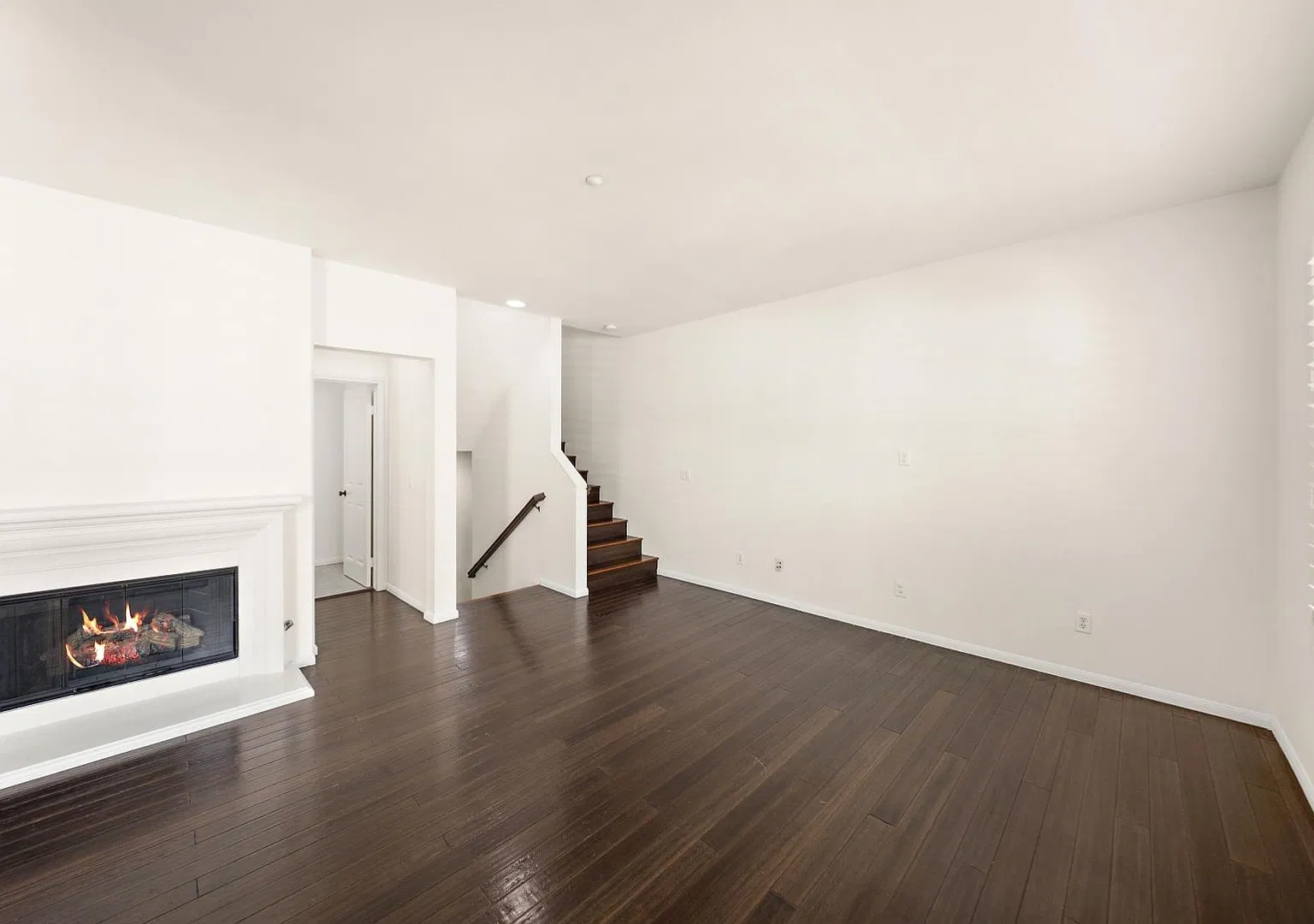 1,330-square-foot townhome offers 2 bedrooms, 2.5 bathrooms, and a 2-car direct-access garage — Photo 3