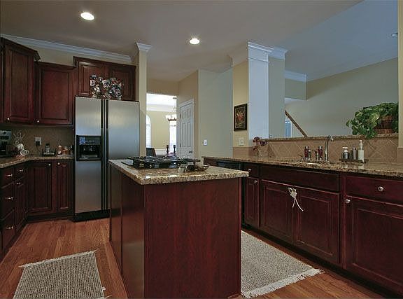Kitchen w/cherry cabinets-granite-stainless