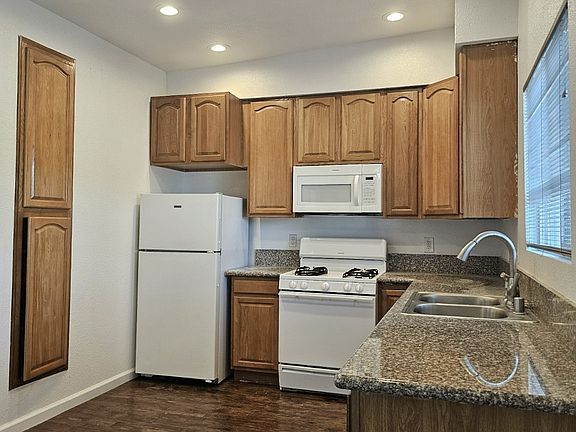 Kitchen with Fridge stove Microwave