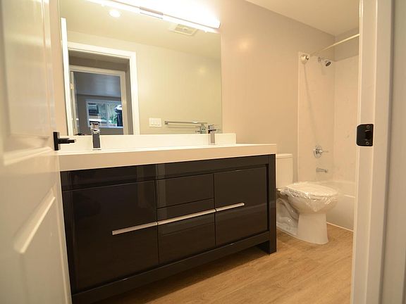 Not your standard size bathroom! This bathroom is large with a modern 2 sink vanity with lots of storage area. No more sharing sinks!