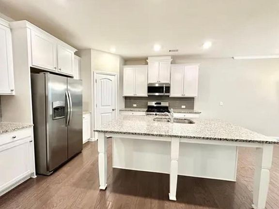5th image of 719 Lansing Grove Way