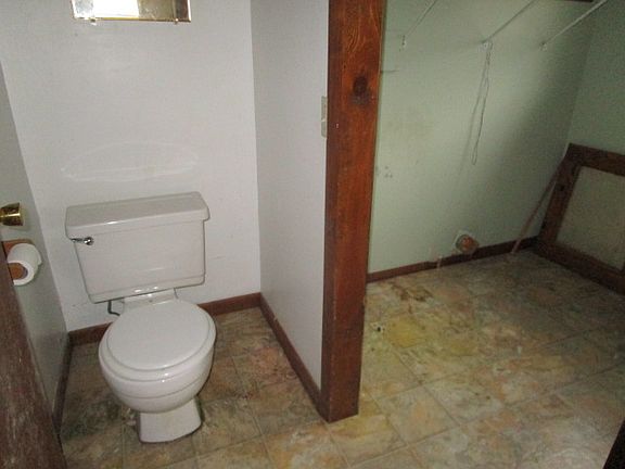 1/2 Bath + Laundry Area