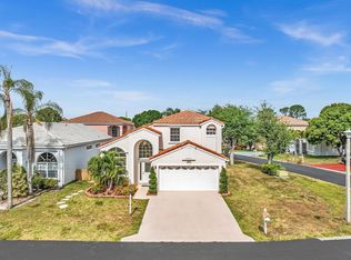 125 Oakwood Way, Greenacres, FL 33463