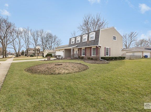 Tons of space in this oversized lot with a fully fenced in backyard.