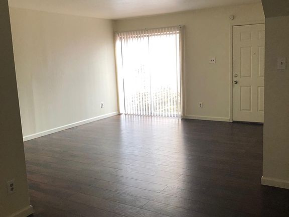 View of living room and front door.