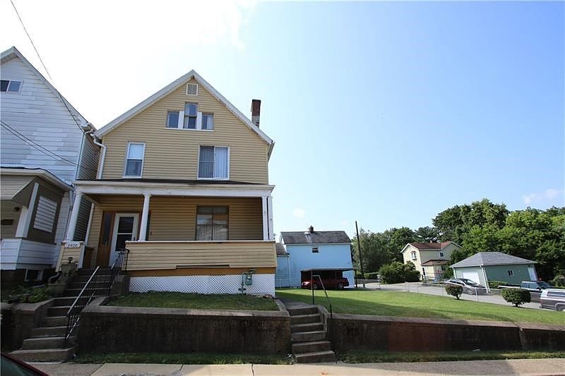 SPACIOUS 3 Bedroom on HUGE Corner Mostly Level Lot w/ Covered Carport & additional Off Street Parking!