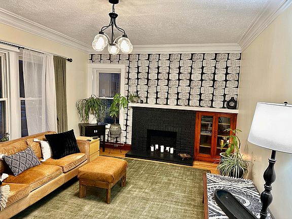 Sunny south facing living room with smart TV.