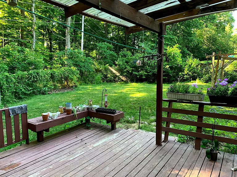 Nice, large and private backyard, backed by verdant forest.