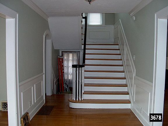 Foyer w/ custom wainscot