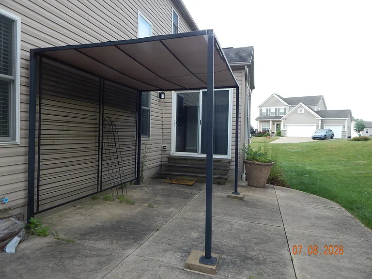 7157 Emerald Glen Ave NW — Photo 3