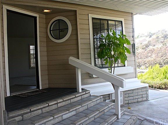 Lovely front entry with patio