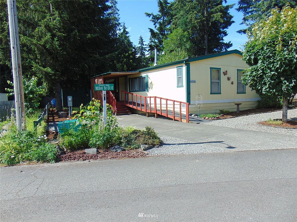 Front entrance to your new home in Quiet Meadows . Covered porch and also wheel chair ramp for easy access.