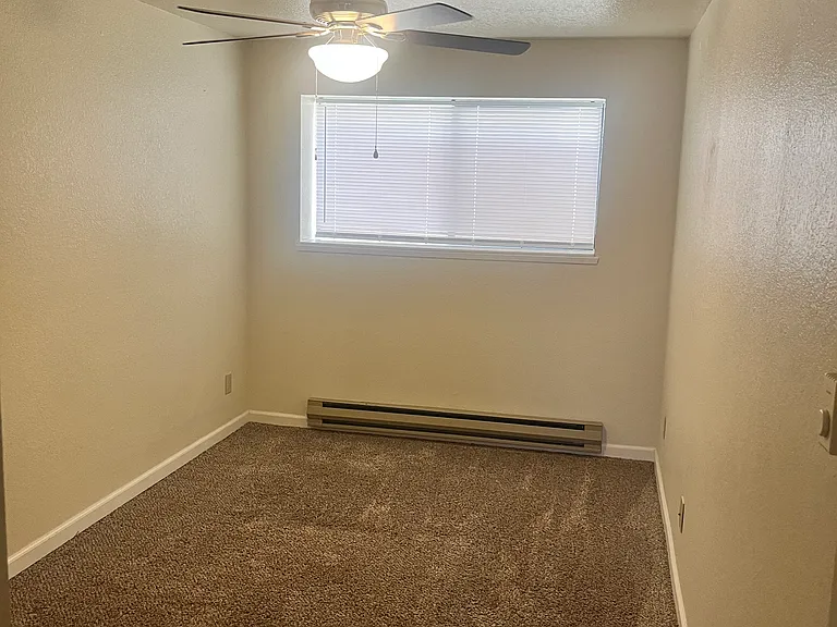 Bedroom with new ceiling fan