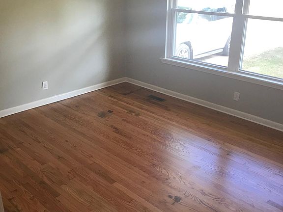 Updated hardwood floors in living room.