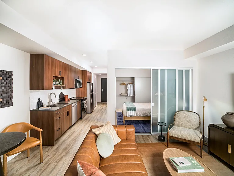 Smart design and warm finishes define this Modera Shoreline home, offering open layouts and refined comfort near Seattle's coastal charm.