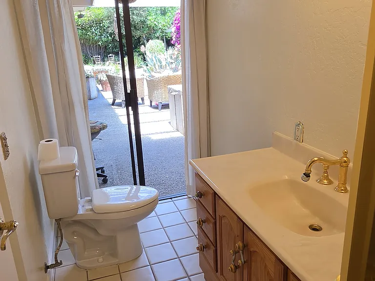 Hall Bath with door to Patio