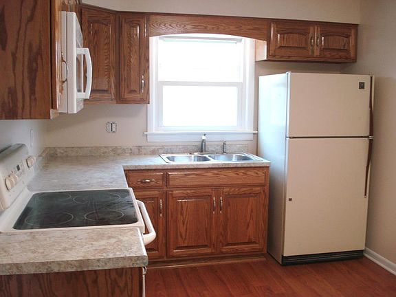 Custom oak cabinets, and all appliances included