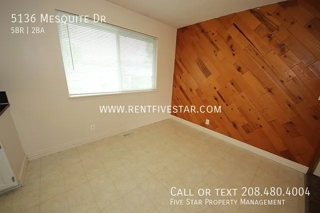 Spacious 5 Bedroom Home with Fenced Yard! — Photo 4