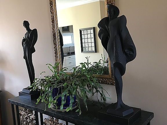 Mirror reflects wet bar