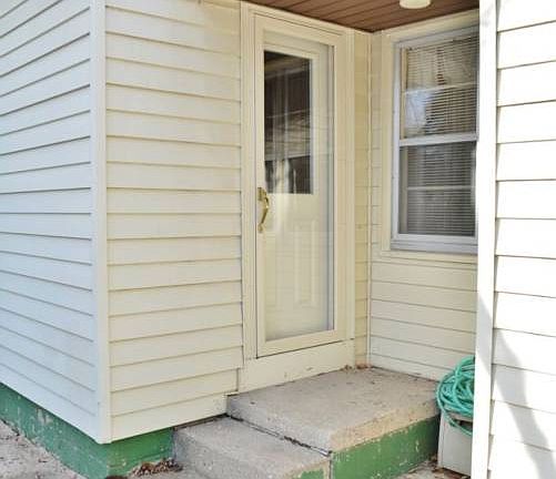 small back porch, with access to back yard.