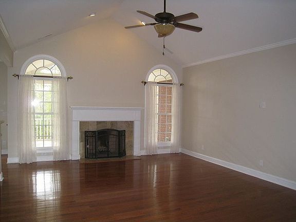 Living Room with Wood Burning Fireplace
