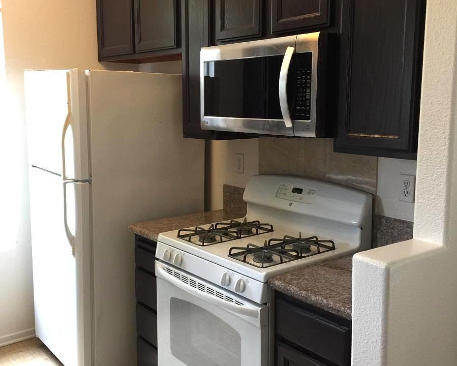 Neat kitchen with ample storage.