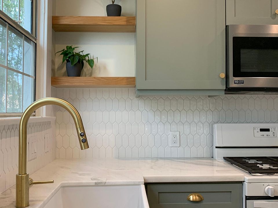 Newer Kitchen - Custom cabinets, marble countertops