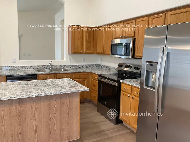 7161 W Pontiac Dr — Photo 4