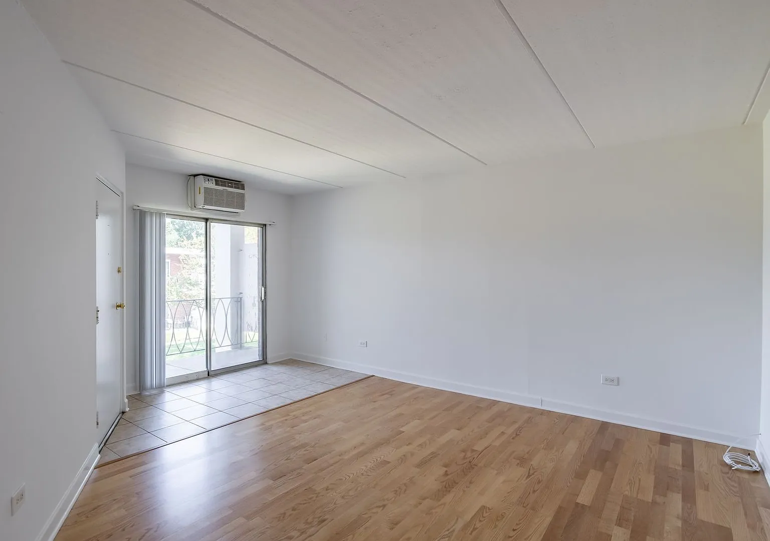 Elmhurst One Bed/One Bath Apartment + Private Balcony - Heat & Parking Included! — Photo 3
