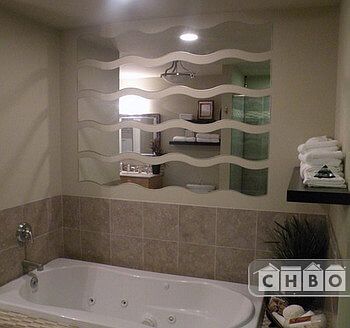 Spacious spa retreat bath quarters has an ove