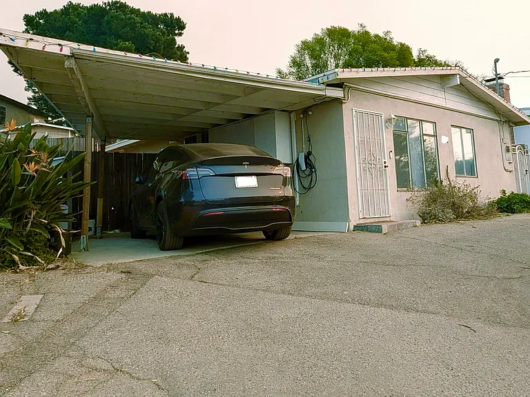 Front with built in Tesla EV charger