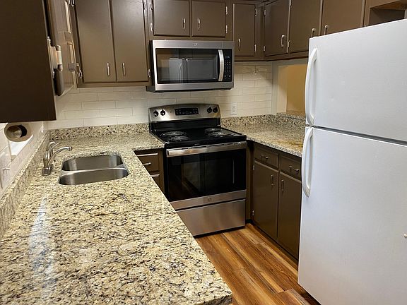 Now has stainless steel refrigerator