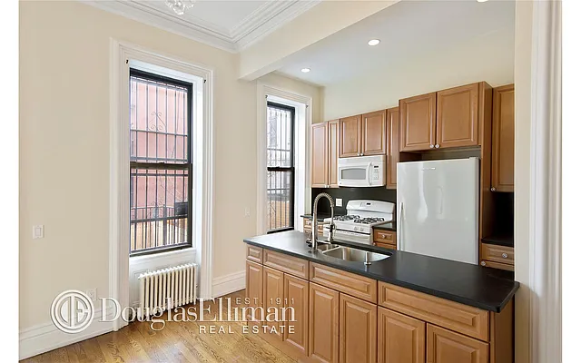 Sold by Douglas Elliman | media 18