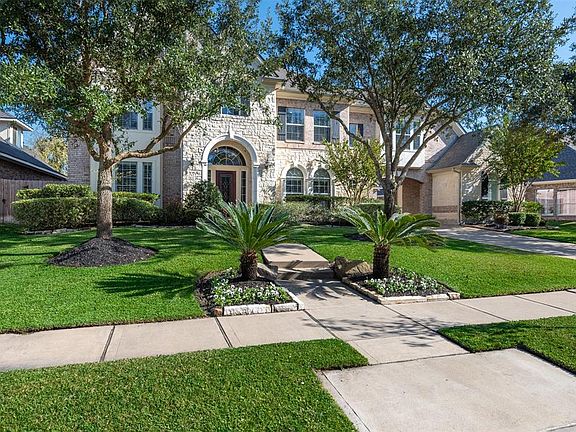 With its brick and stone elevation, 3-car garage & porte-cochÃ¨re, this home makes a grand first impression!