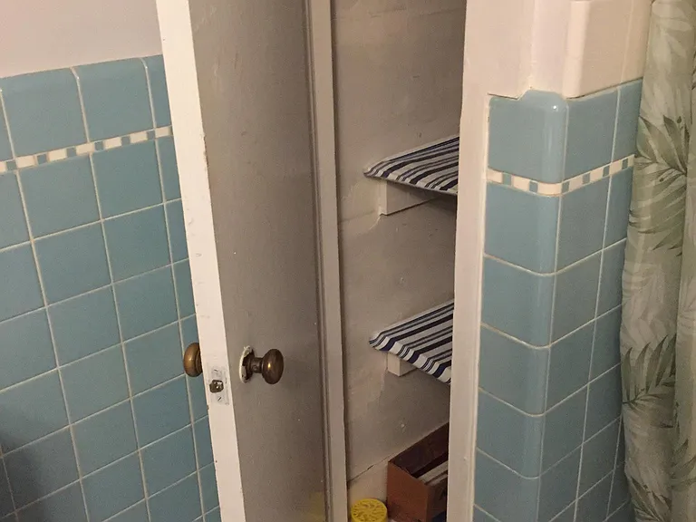 linen closet in bathroom