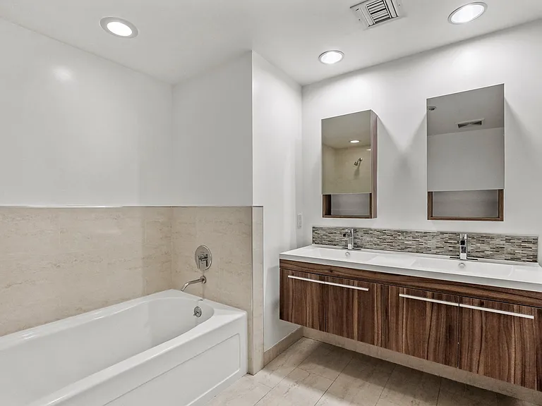 Large-Size Bathroom with Double Vanity and Bathtub