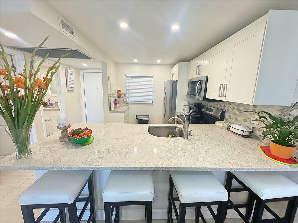 1st image of 9440 Poinciana Place #105