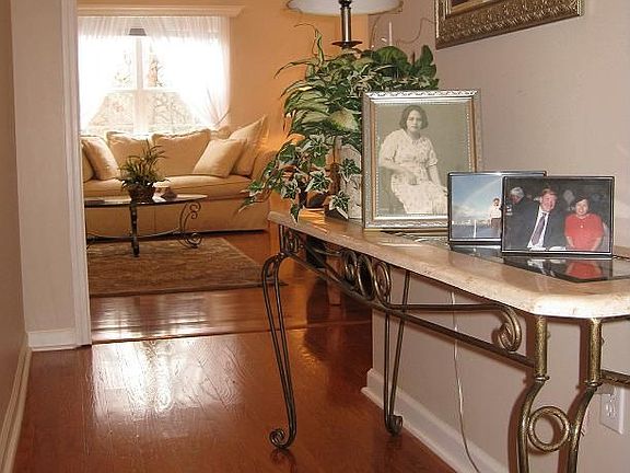 Hardwood floors in the foyer, greatroom, and hallways.