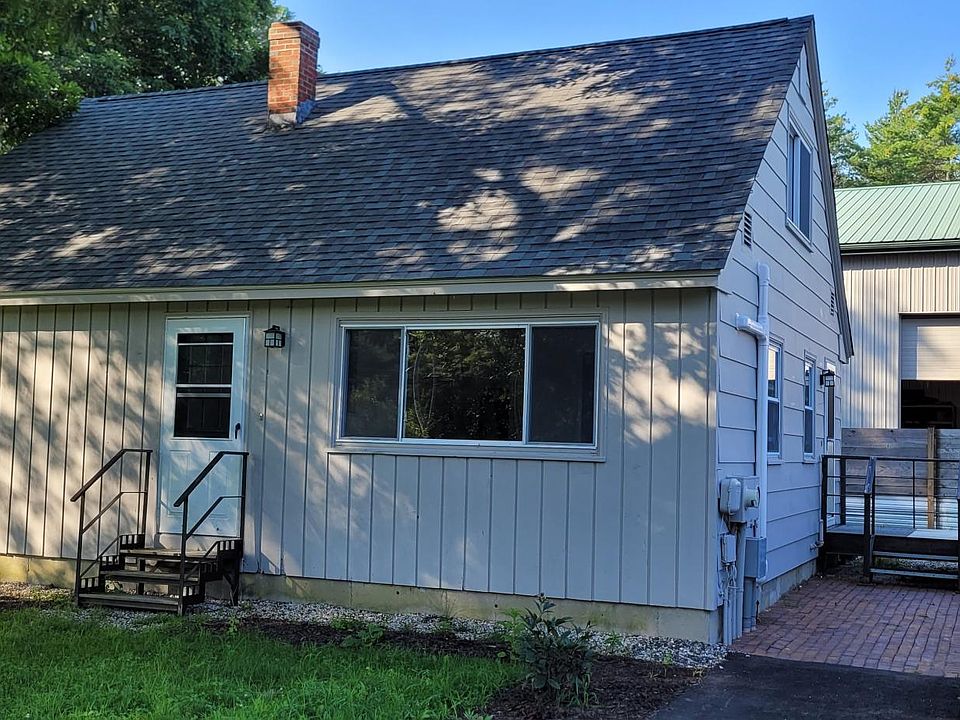 Tenant entry, brick walkway, new entry steps, paved parking spots, privacy fence, recent paint, well cared for grounds.