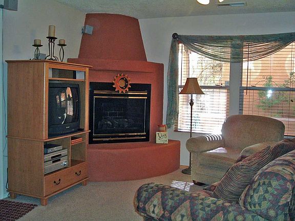 Living room overlooks front courtyard.