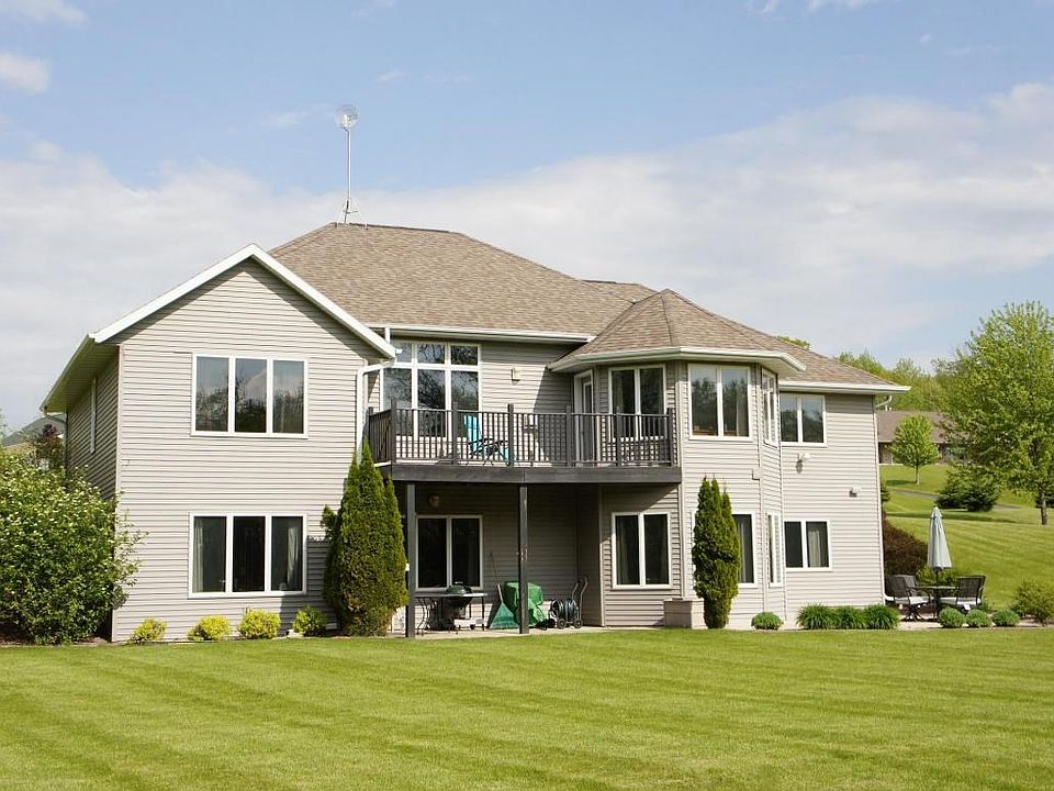 Custom Home on Over 3 Acres With Pond!